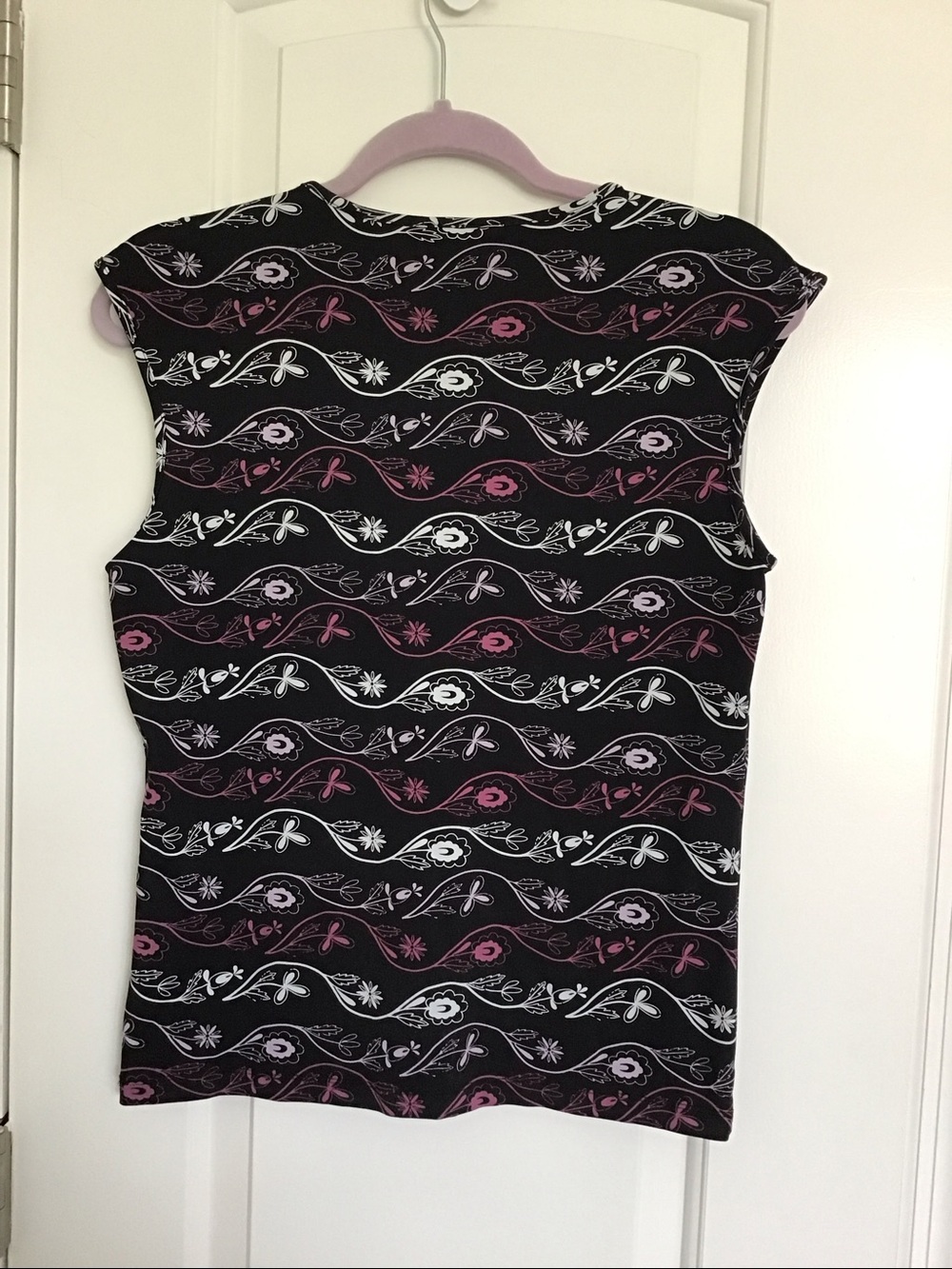 Y2K The Limited black V-neck tank top featuring a white and pink floral vine. - Picture 2 of 7